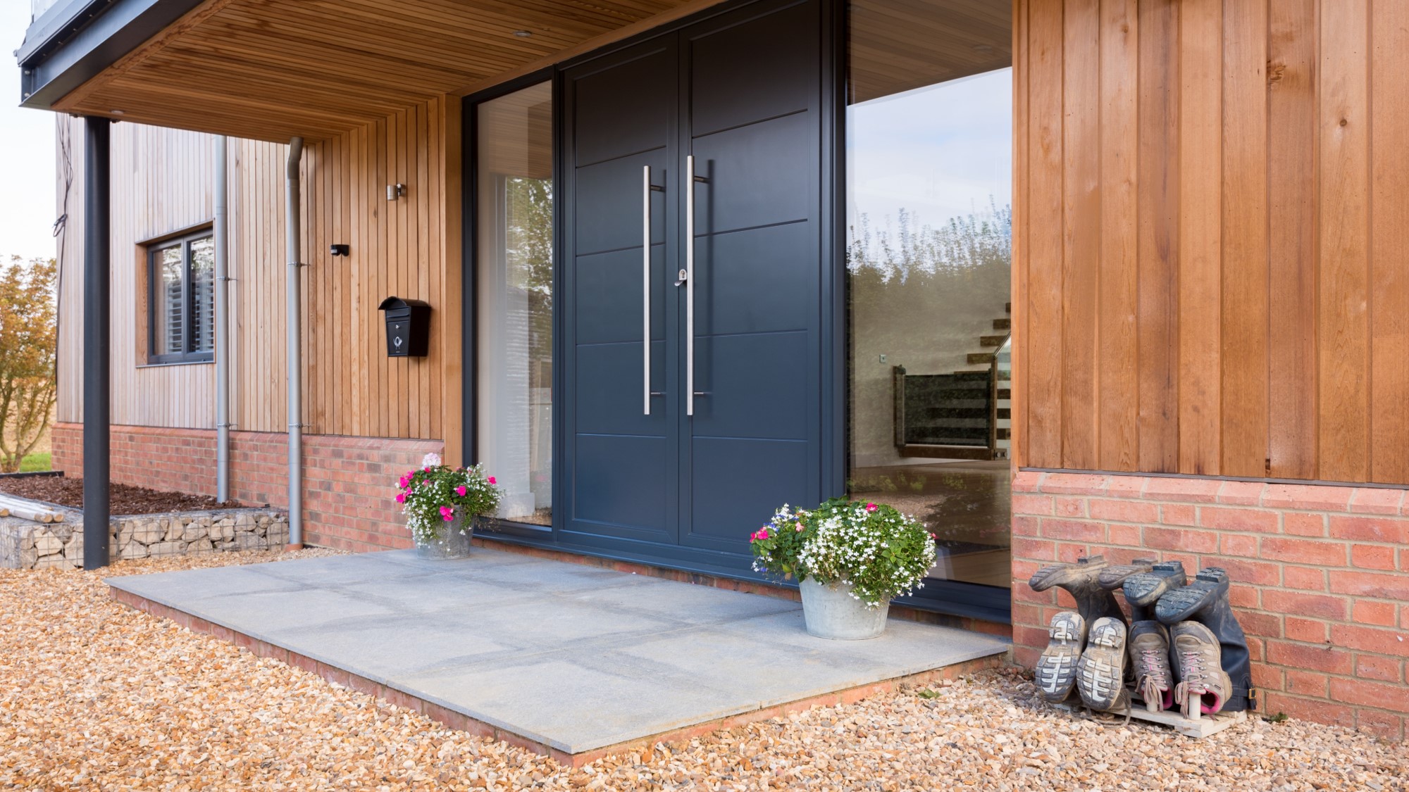 composite front door in matching colour to window frames
